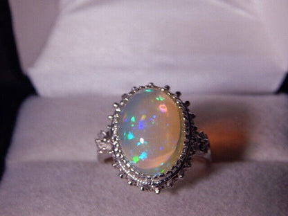 Natural  5.92 Ct. Oval Cabochon Opal Sterling Silver Ring October's Birthstone Ring For Love